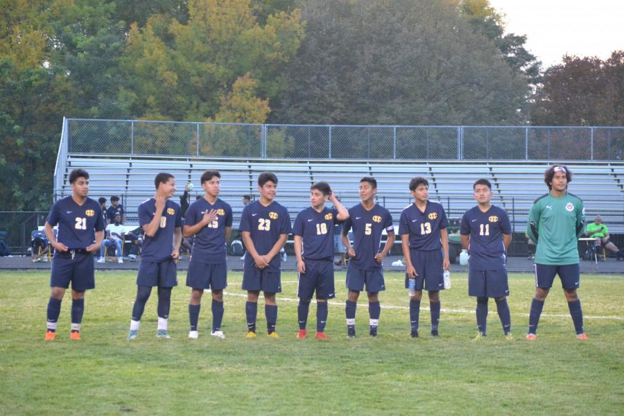From left to right: Ivan Delgado Cruz (12), Ahmed Amine (12), Brady Gomez (12), Alex Jara (12), Alex Ortiz (12), Christian Riera (12), Johnny Llivisaca (12), Diego Giles (10) and Jose Jacinto Bastarrachea (12) line up on the field.