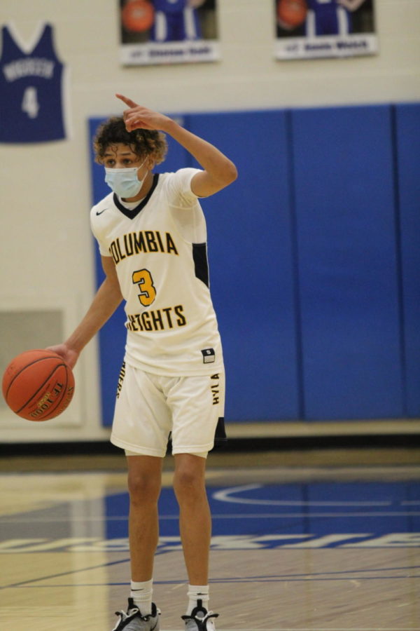 Terrence Brown (11) masked up for the Hylanders February 27 game against Minneapolis Southwest, which resulted in a W for Heights.