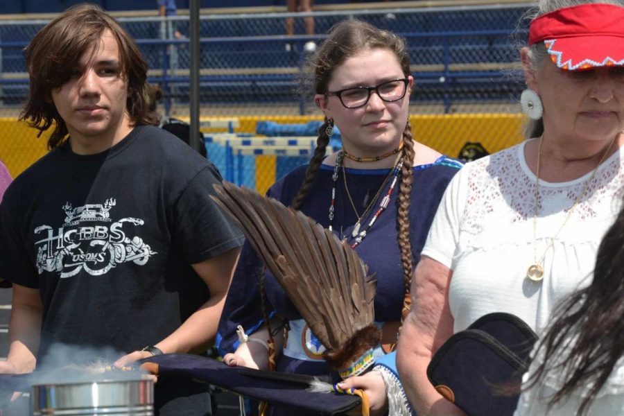 From left to right, Calvin Harper, Sage Houts and Valerie Larsen at the Columbia Heights Pow wow.