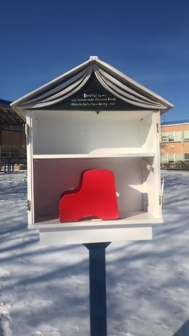 The newest edition to the little library collection in Columbia Heights is right behind the high school in the Blooming Heights community garden.