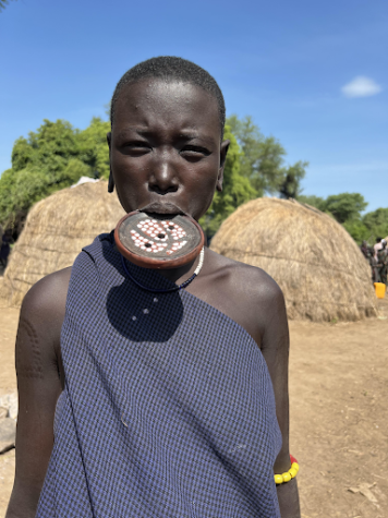 The female members of the Mursi tribe of Ethiopia start wearing lip plates around puberty to signify their journey to womanhood.