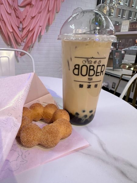 The perfect duo of a churro mochi donut with a tasty milk tea boba on the side is just whats needed to feed your sweet tooth, Osob Mohammud suggests.