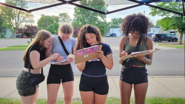 Members from all around Columbia Heights, including students from CHHSs graduating class last year (from left to right: Sydney Miller, Lilah Bergan, Saniah Howard-Reynolds and Heaven Gg) came together to sign the recall petition.
