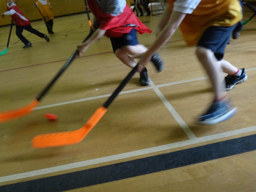 Few sports are as thrilling as running across the hardwood after a loose rubber puck. Floor hockey rules!