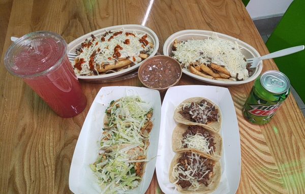 Fries, queso, cheese and tacos with beverages and a side of beans are a sure-fire dinner success from Los Cactus.