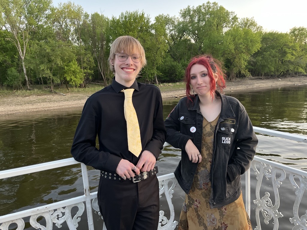 Prom Committee advisor and English teacher Ms. Schaefer photographs her son Felix (11) at prom alongside Winter Kieffer (11).