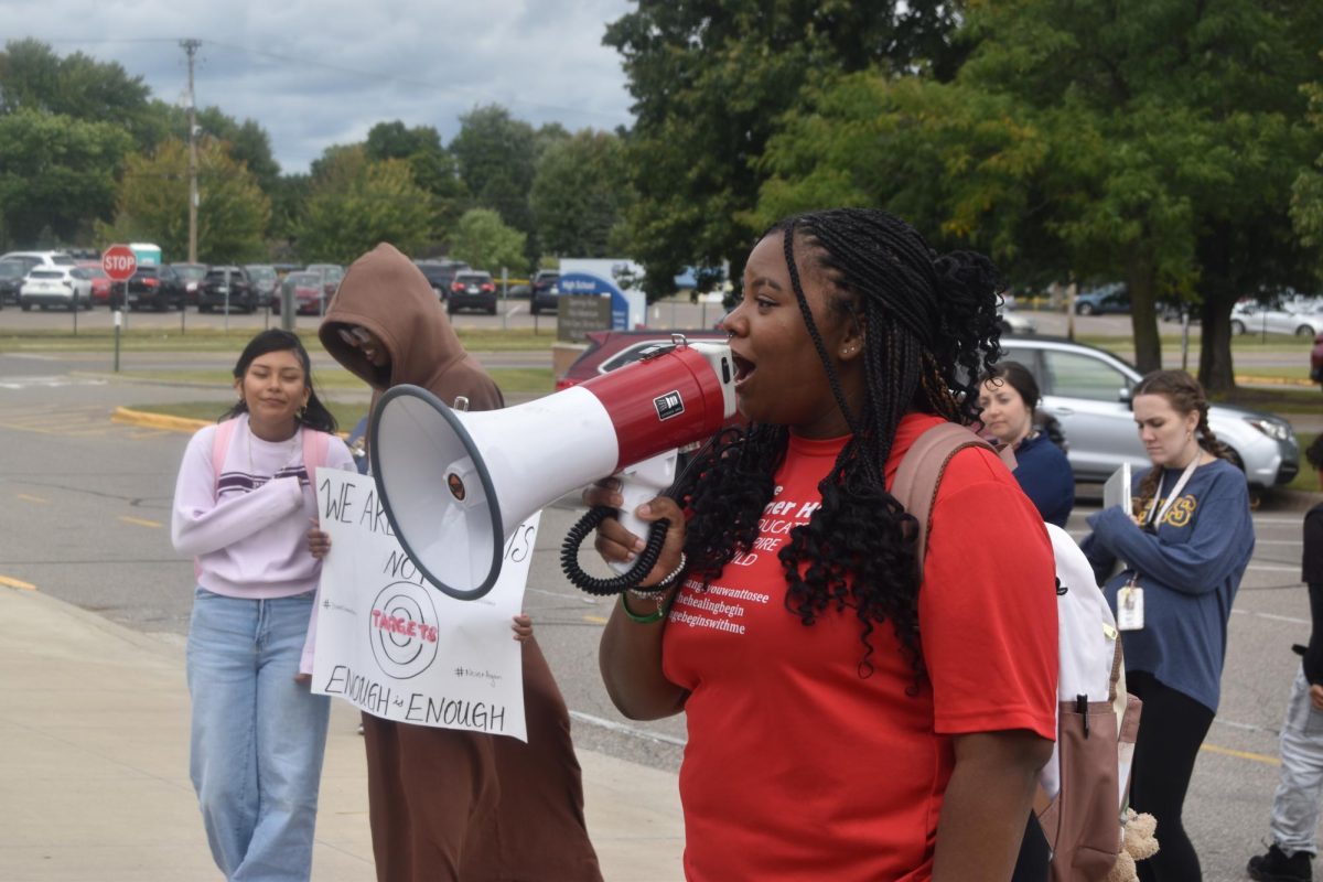 Ja' Sirah Barber (12) reads a passionate speech demanding change for Minnesota gun control.