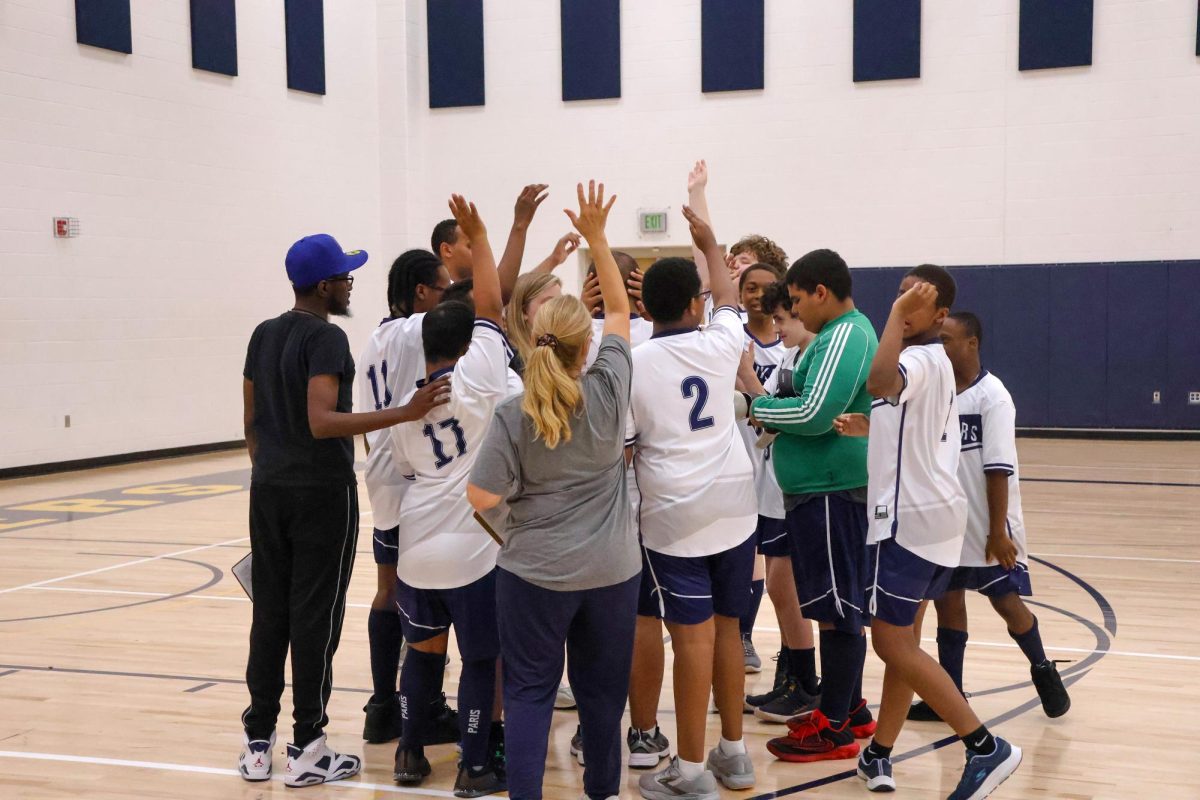 The Columbia Heights Strikers in a huddle.