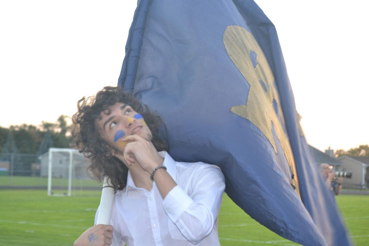 Vaughn Granlund (12) shares his Heights pride waving the Hylander flag at a fall 2025 football game!