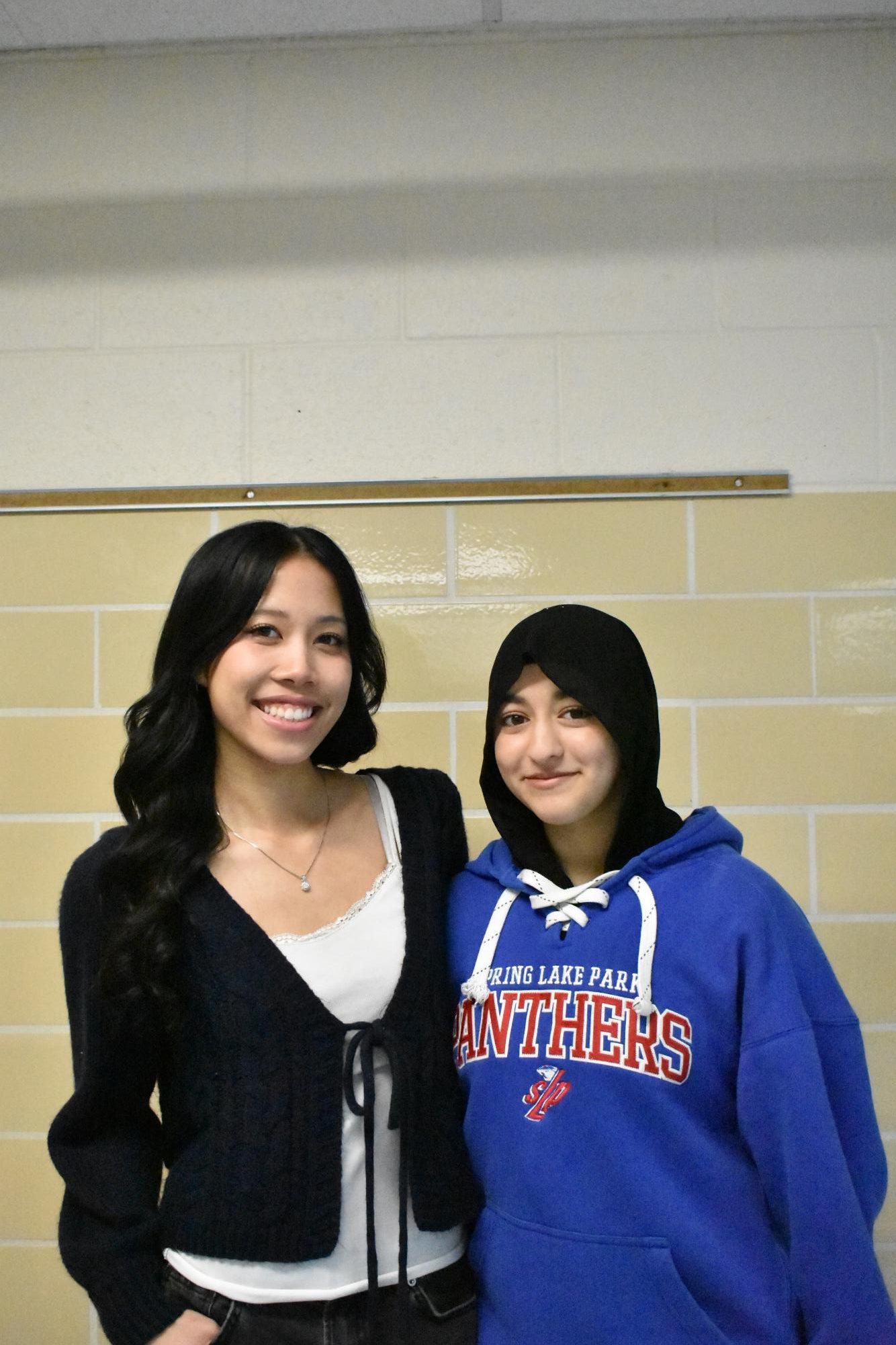 Knowledge Bowl members, Danchau Le (left) and Yumna Ali (right)