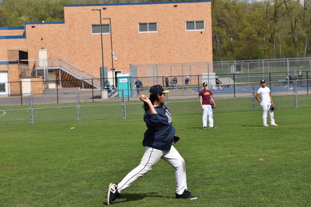 The ball mid-play being thrown to another player.