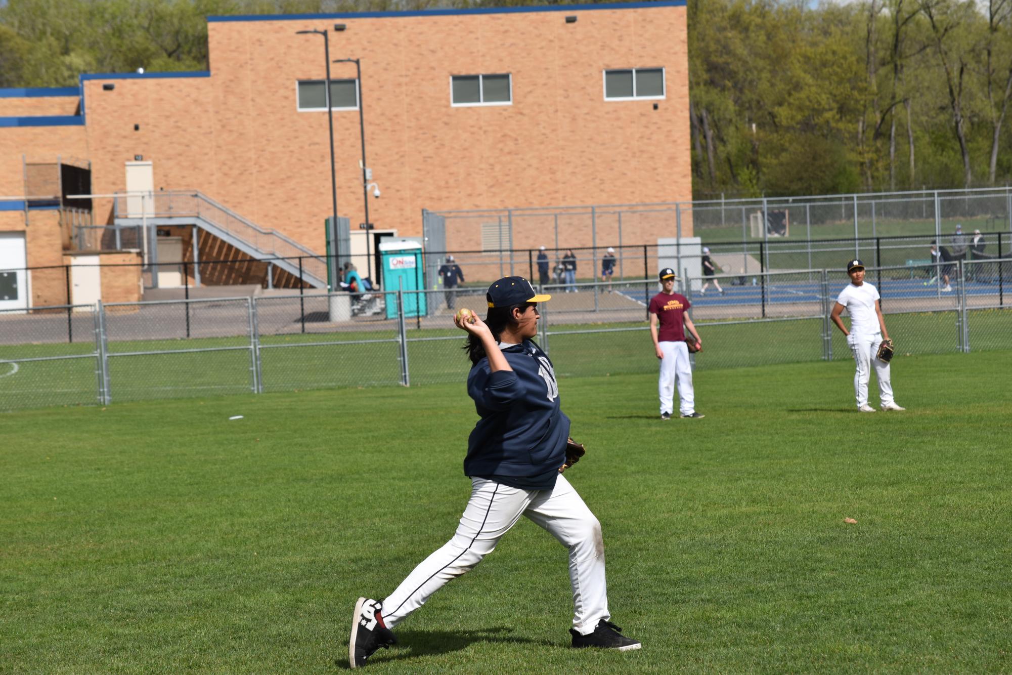 The ball mid-play being thrown to another player.