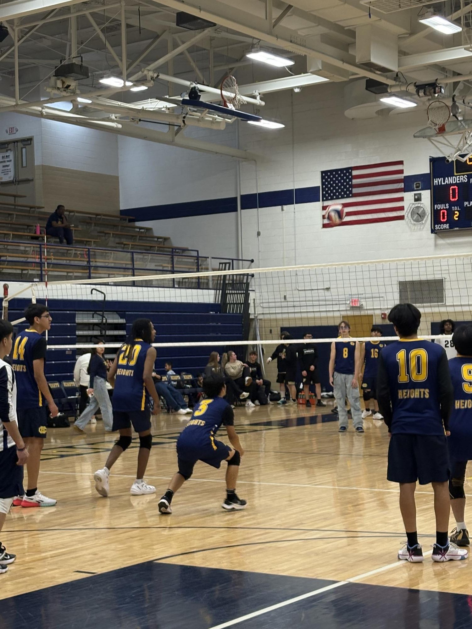 The volleyball team practicing their drills
